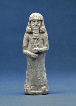 A clay figurine in the shape of a lahmu, a protective deity