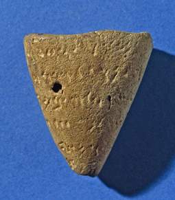 A triangular clay docket from Nineveh
