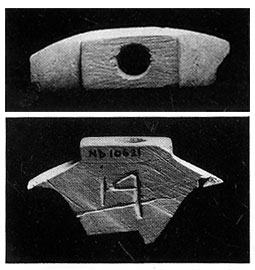 A fitters' mark on a Nimrud ivory, showing the Aramaic letter resh